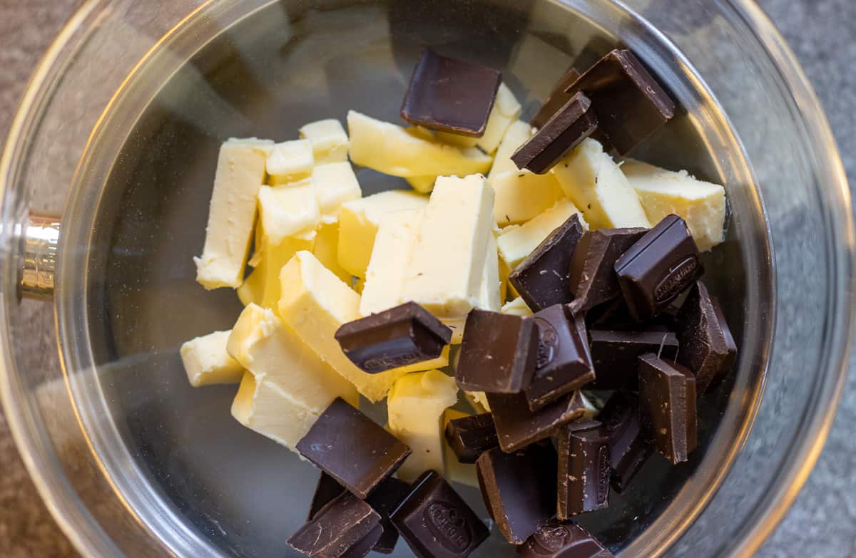 melting the butter and chocolate on benmarie to make fudge dark chocolate brownie