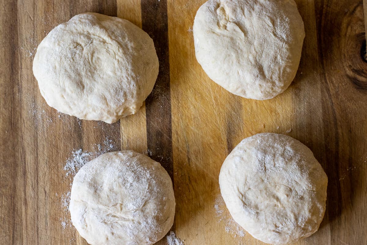 The dough is divided into 4 pieces