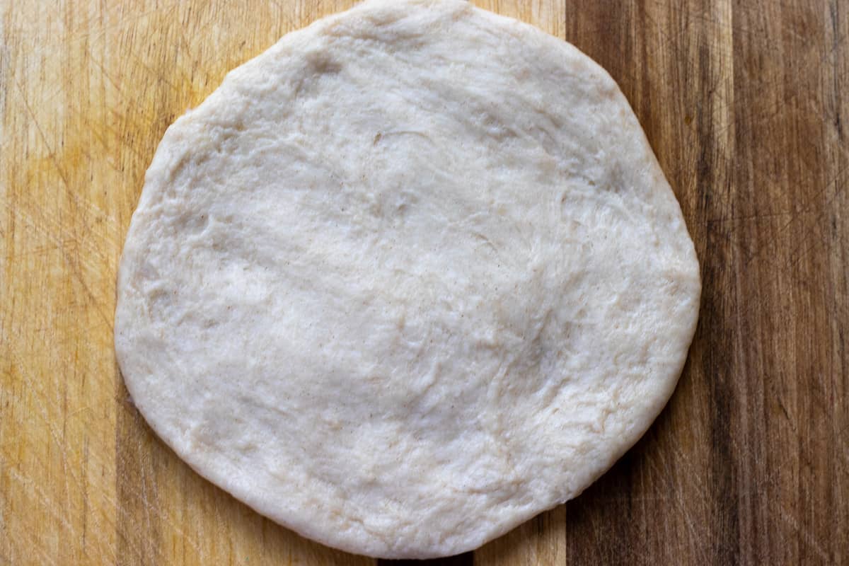 a dough ball rolled into a small circle