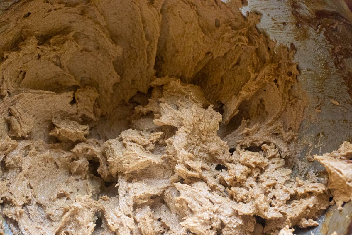 gradually adding the eggs, treacle and golden syrup