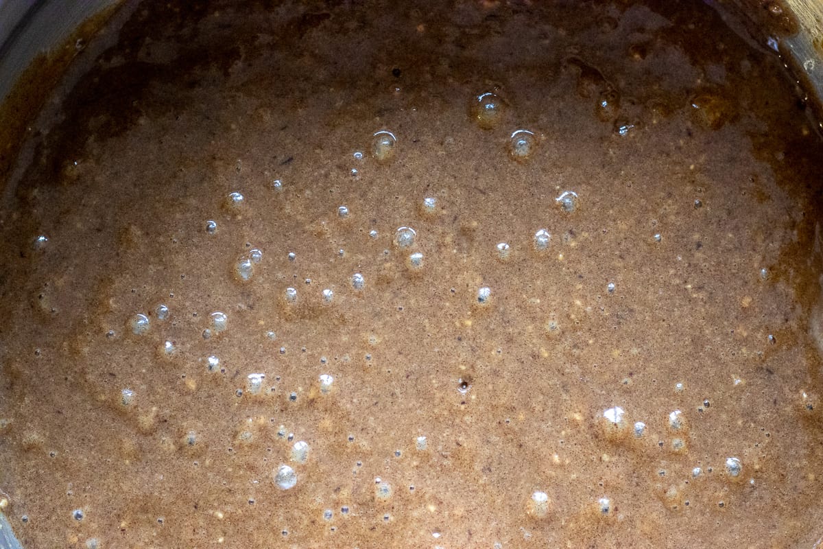 the flour is gently folded to the wet ingredients