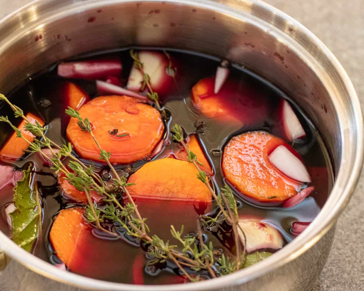 marinating the beef bourguignon