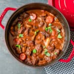 French slow cooked beef stew in a Dutch oven