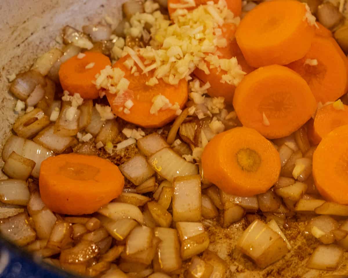 Sautéing the carrots and garlic