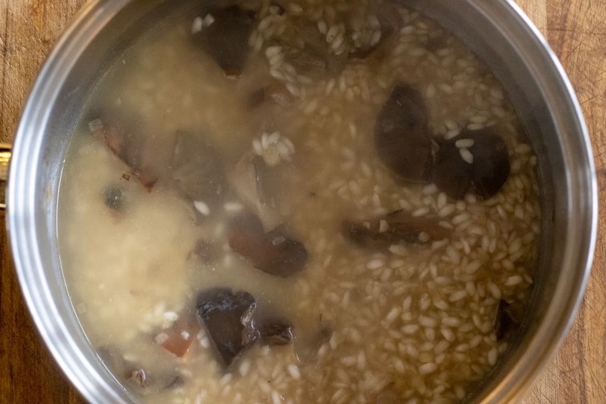 adding the stock to rice