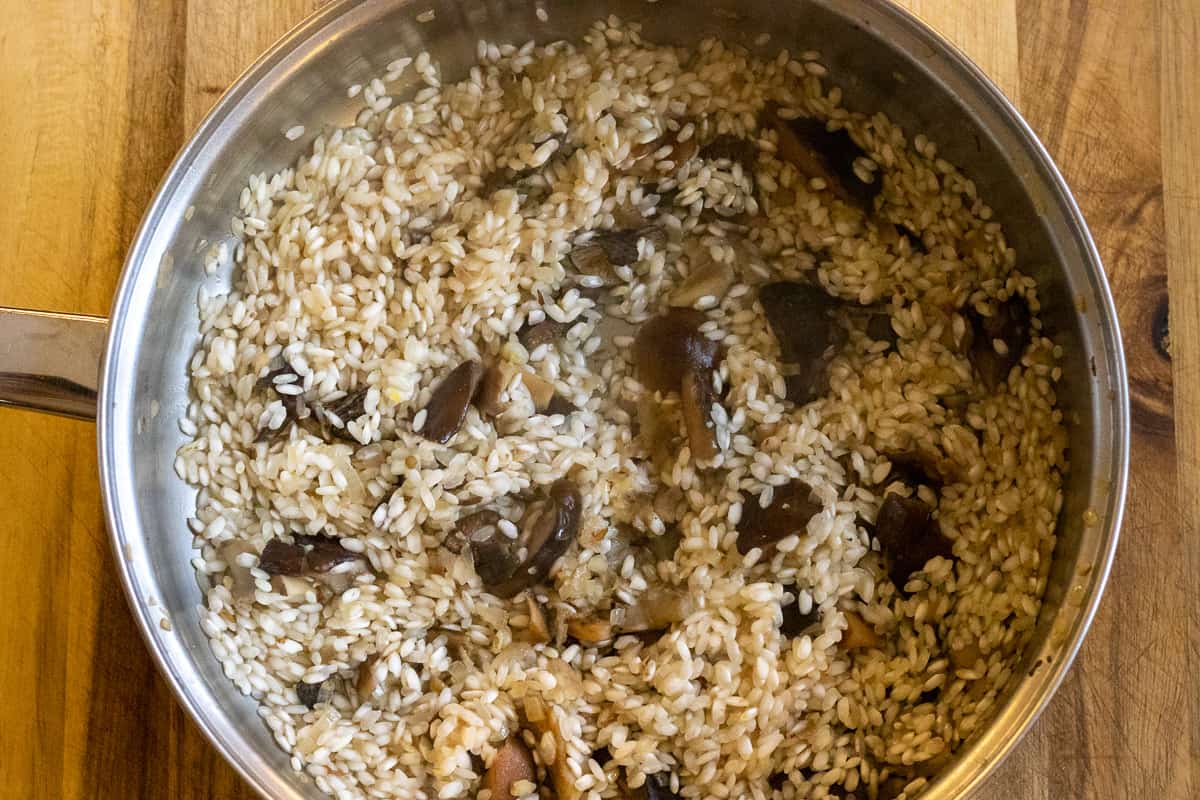 the white wine is added to riceit