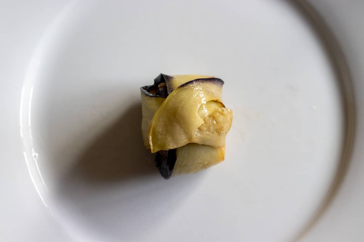 aubergine slices wrapping the meatball