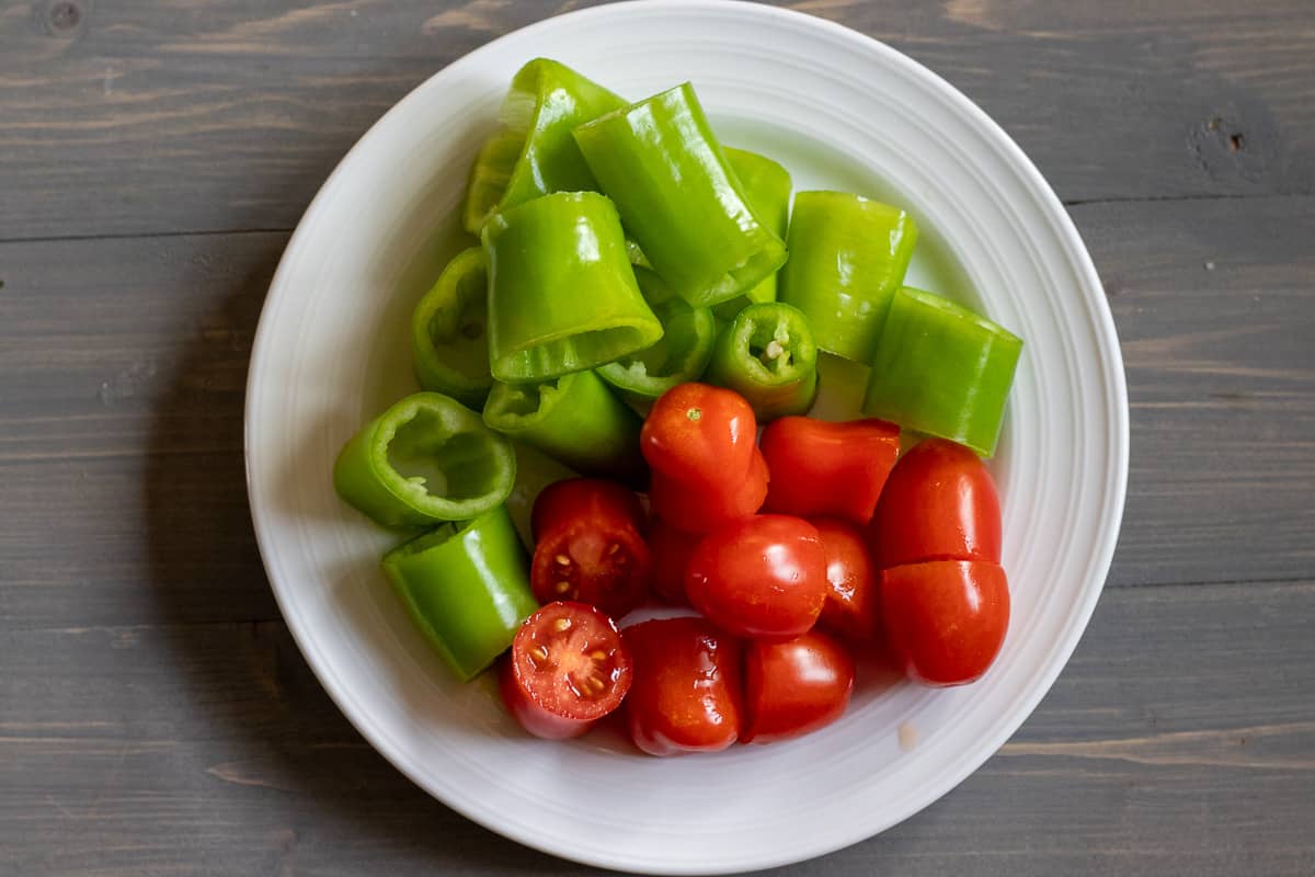 tomatoes and peppers are prepared to garnish Islim kebabi