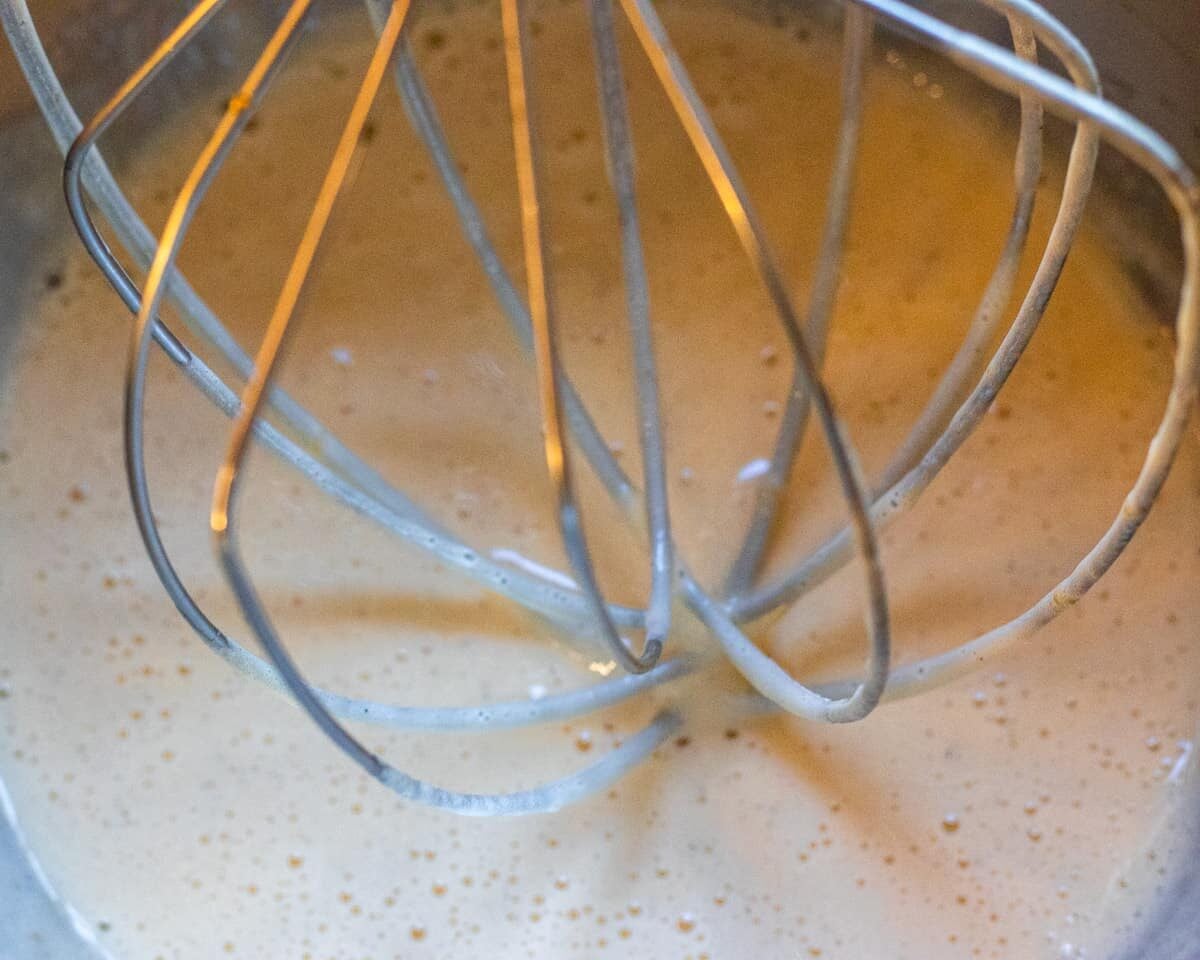 milk and oil is added to whisked eggs