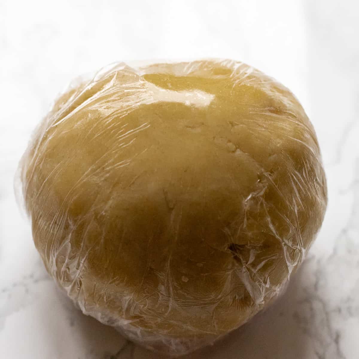 Shortcrust pastry wrapped in cling film