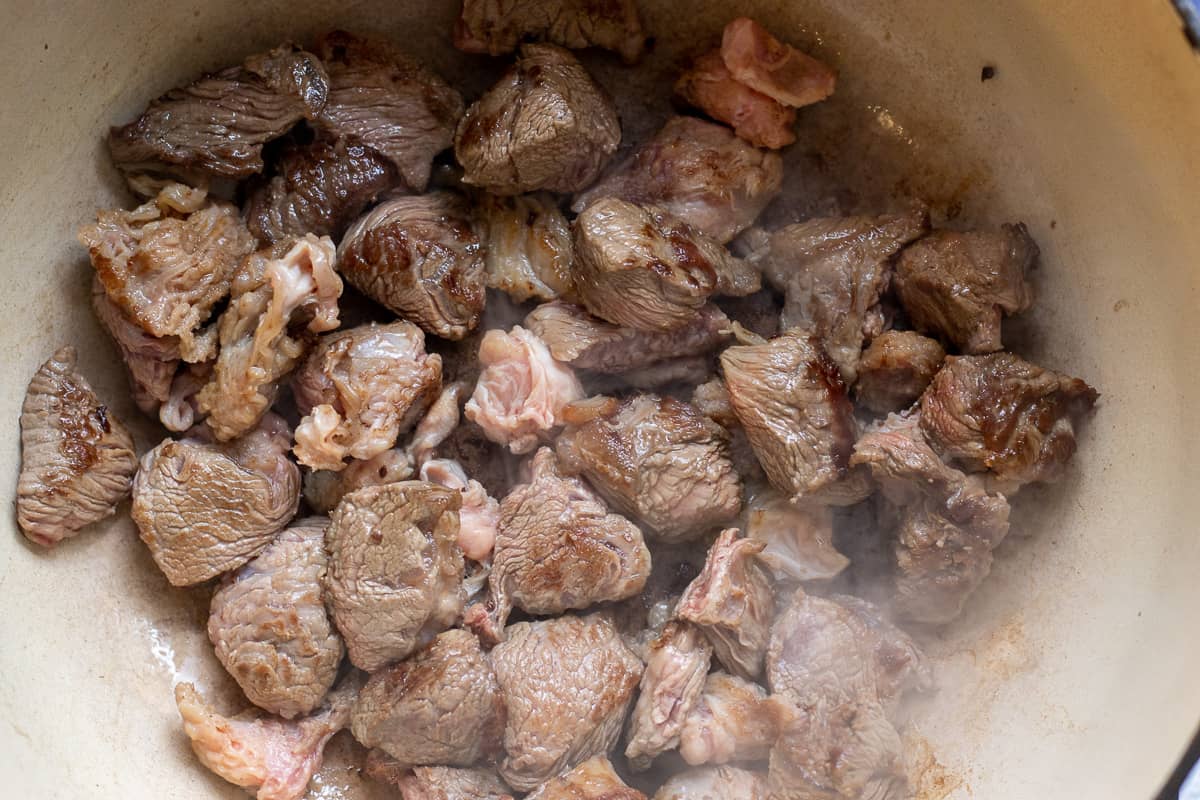 browning the beef in a dutch pan