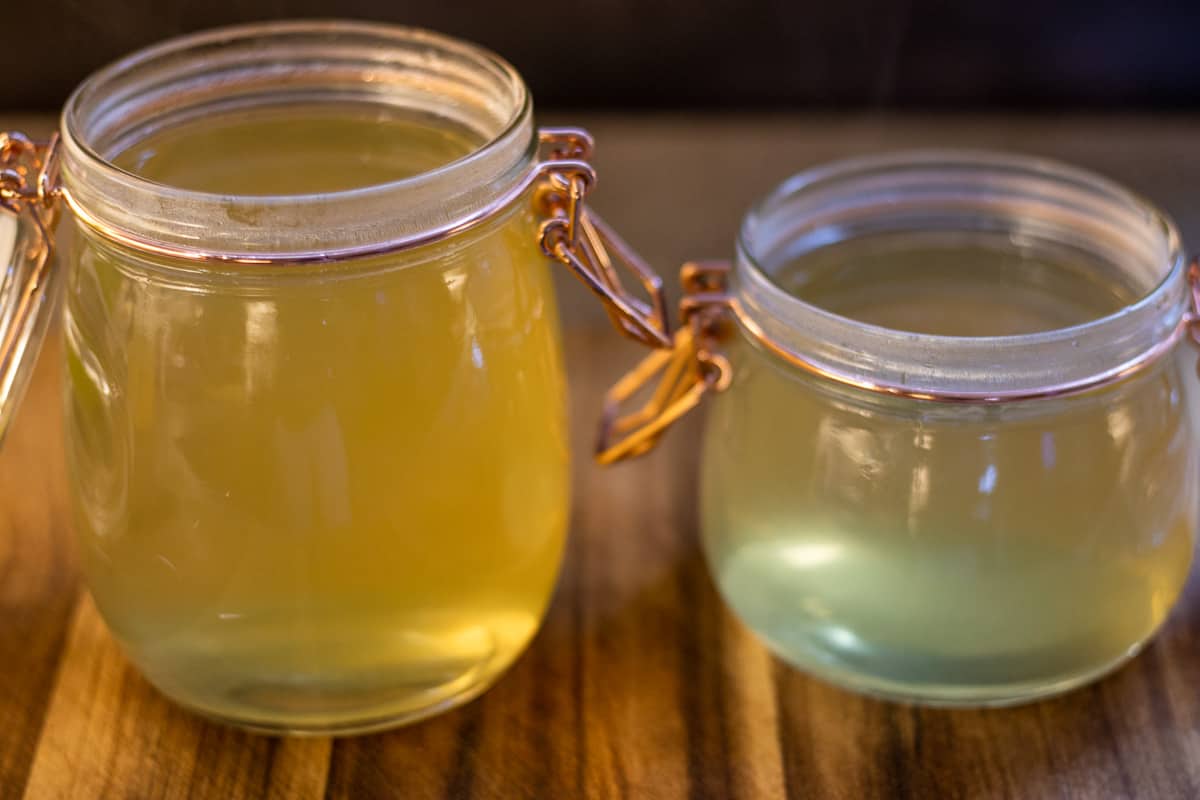 vegetable stock cooling down in jars