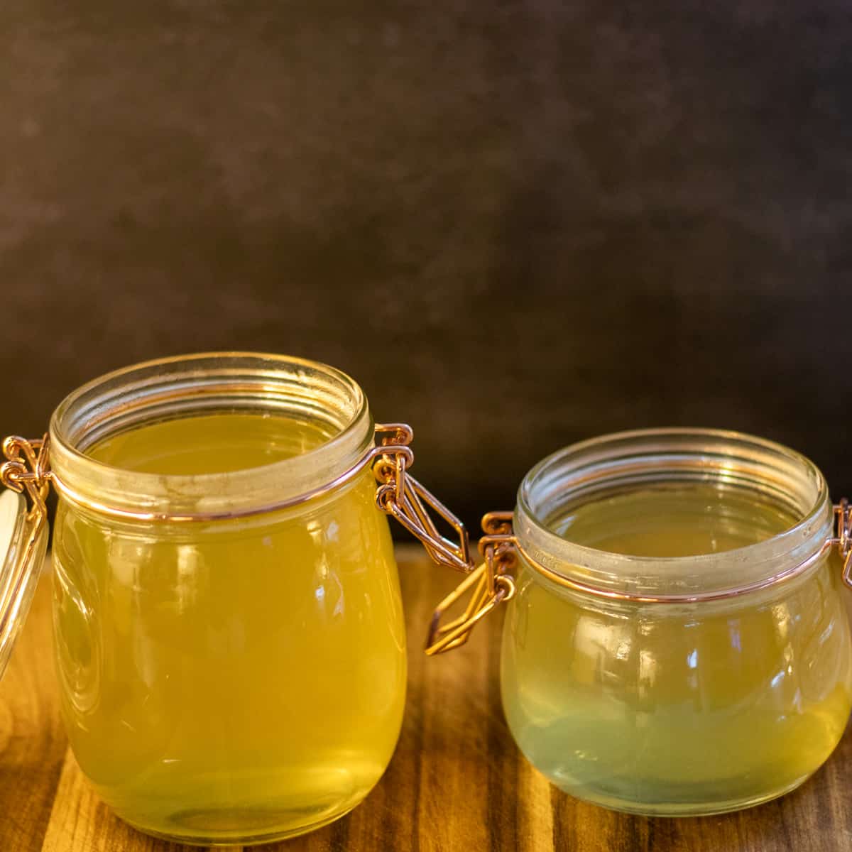 basic homemade vegetable stock in 2 mason jars