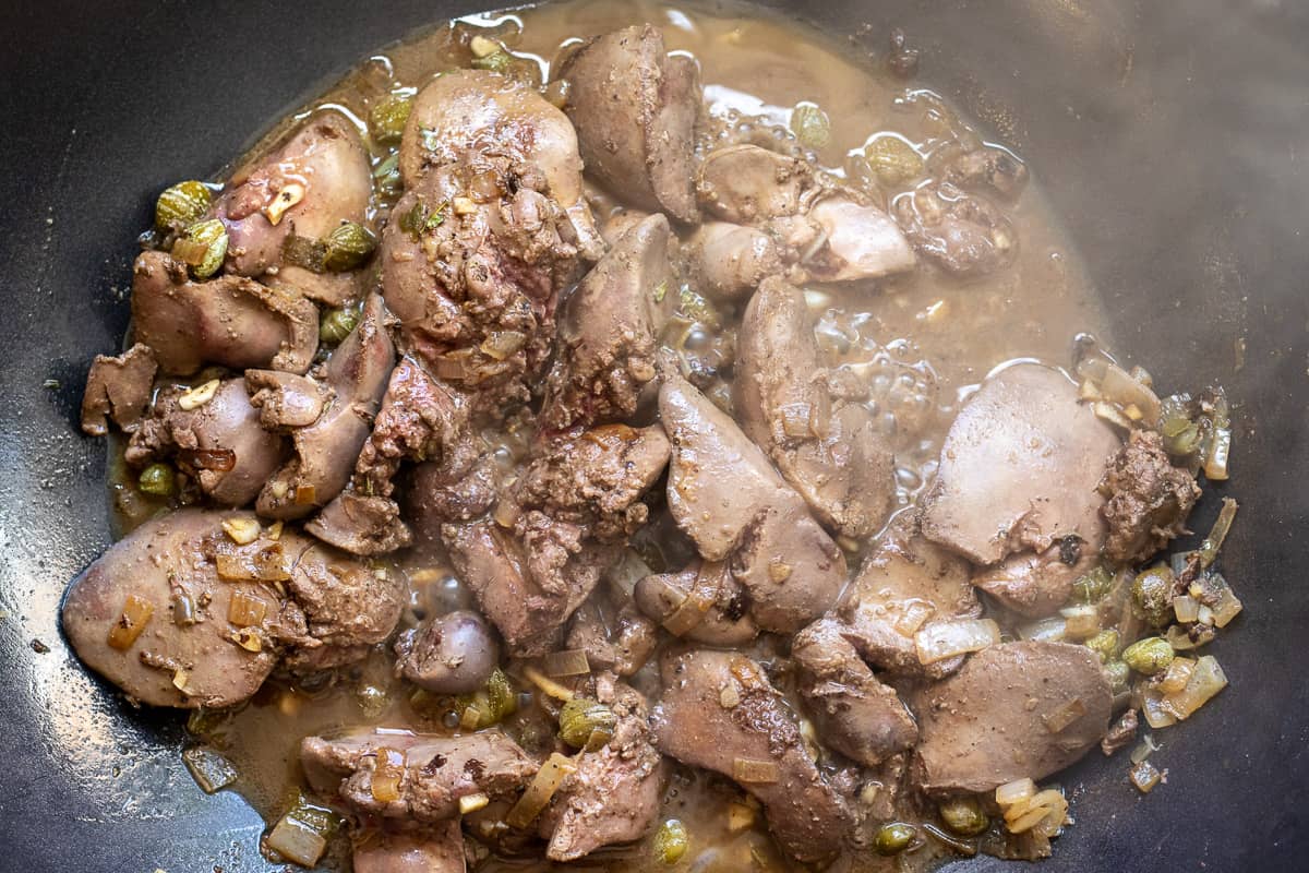 cooking the brandy until it reduce to syrup consistency