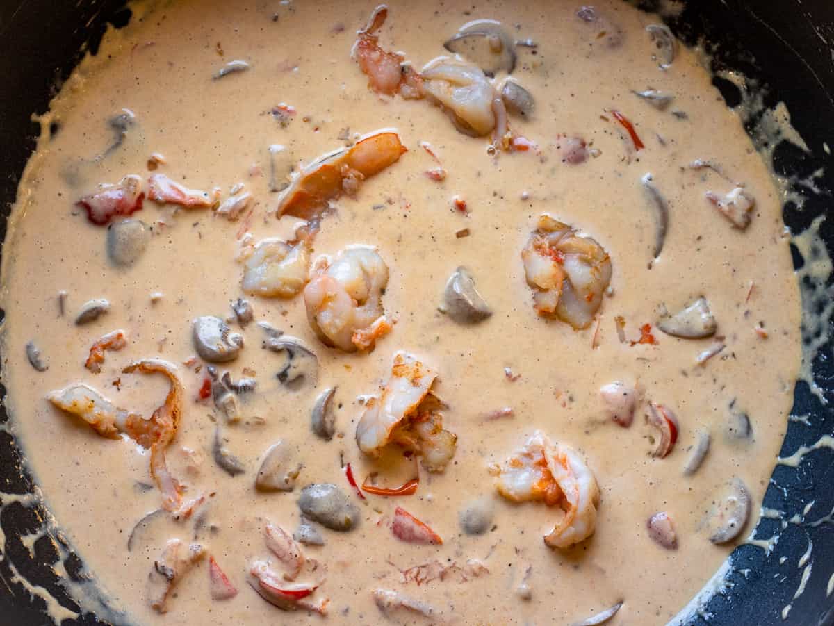 the prawns are added to the pan
