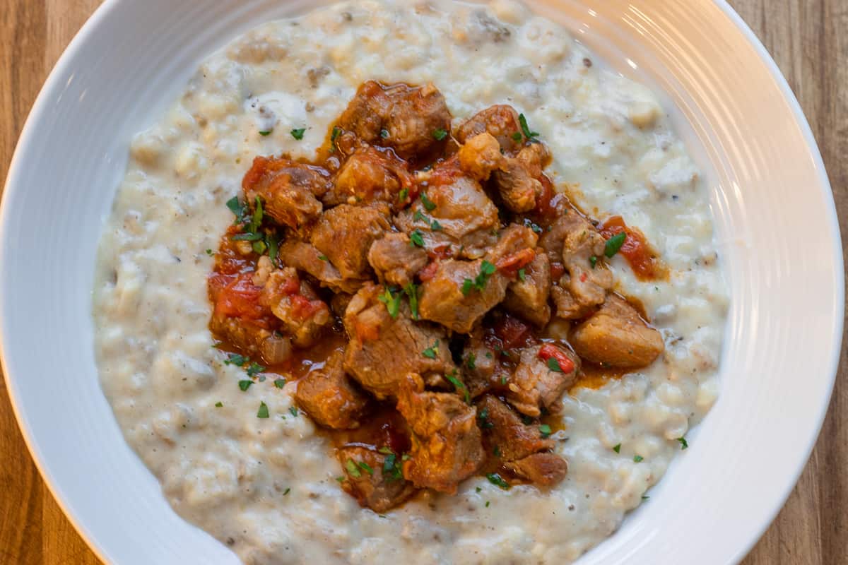 hunkar begendi garnished with chopped parsley 