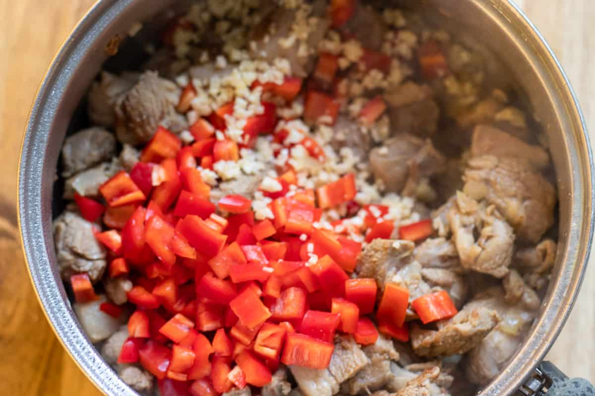 Sautéing the peppers and garlic