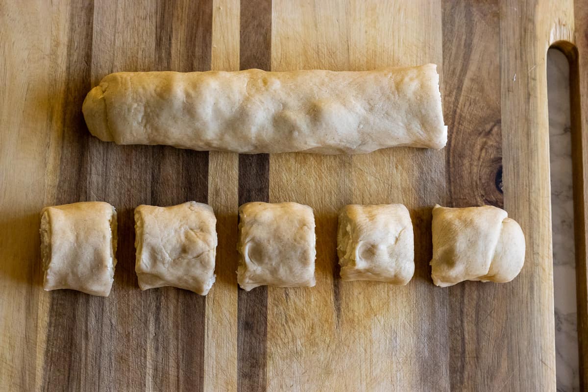 the dough has tightly rolled into a log shape