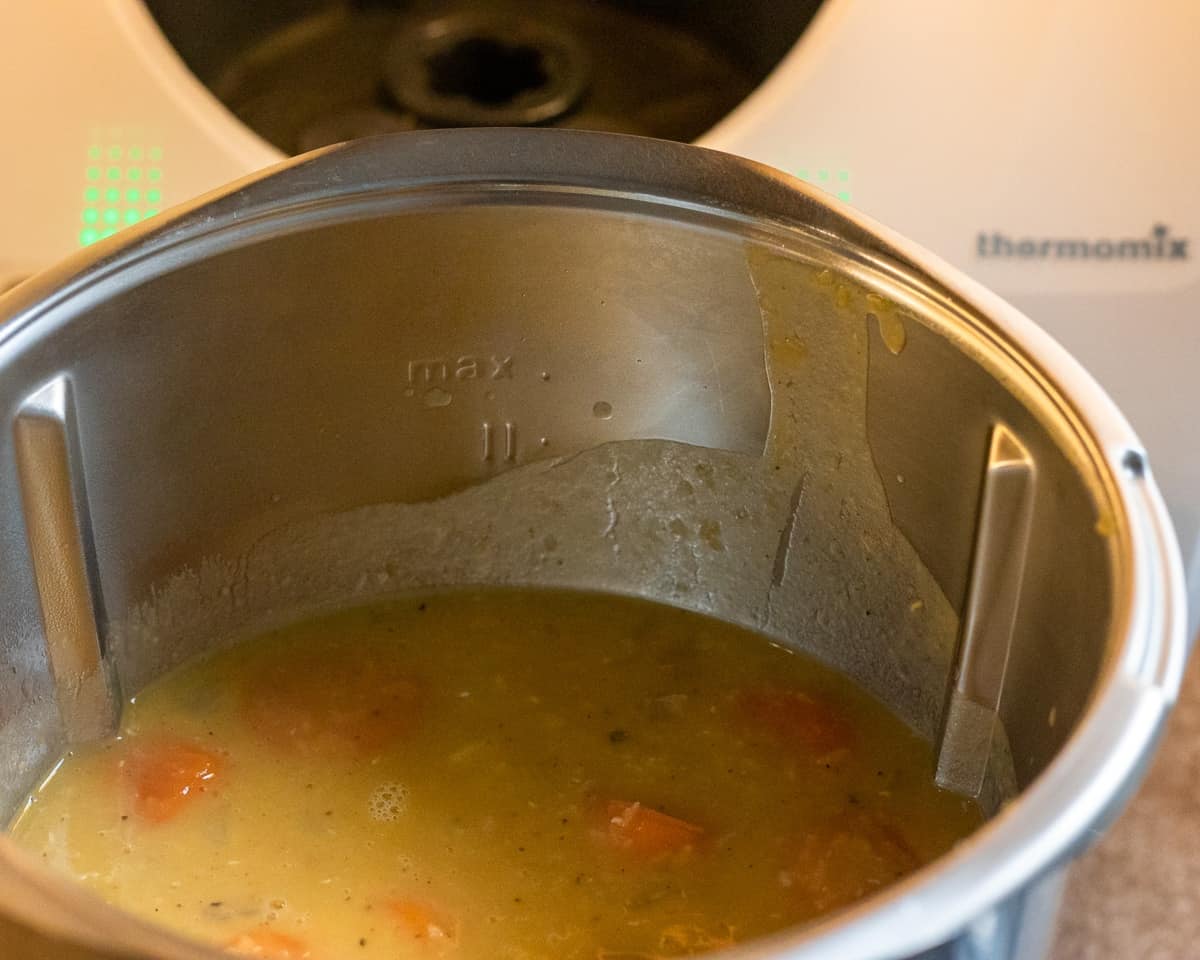 Mercimek Corbasi is placed in a bowl of a food processor for blitzing