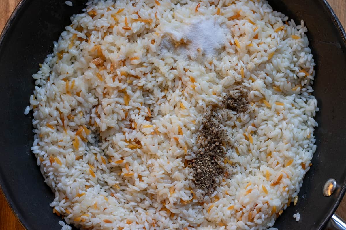the rice and salt are added to the orzo