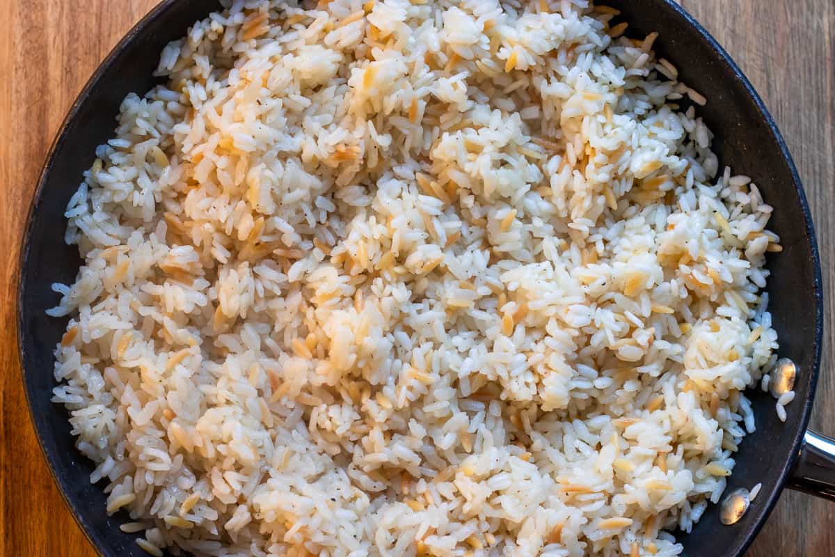 the rice is fluffed after resting for 10 minutes before serving