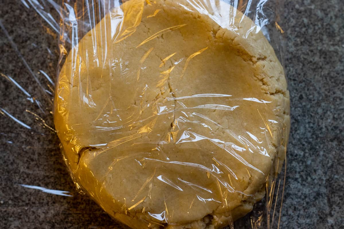 the pate sucre is wrapped in cling film