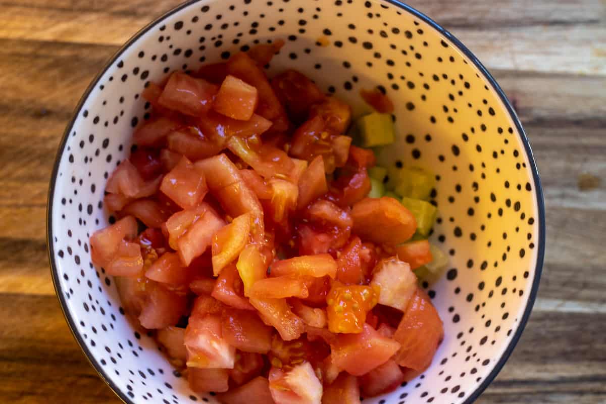 the tomatoes are cut in cubes