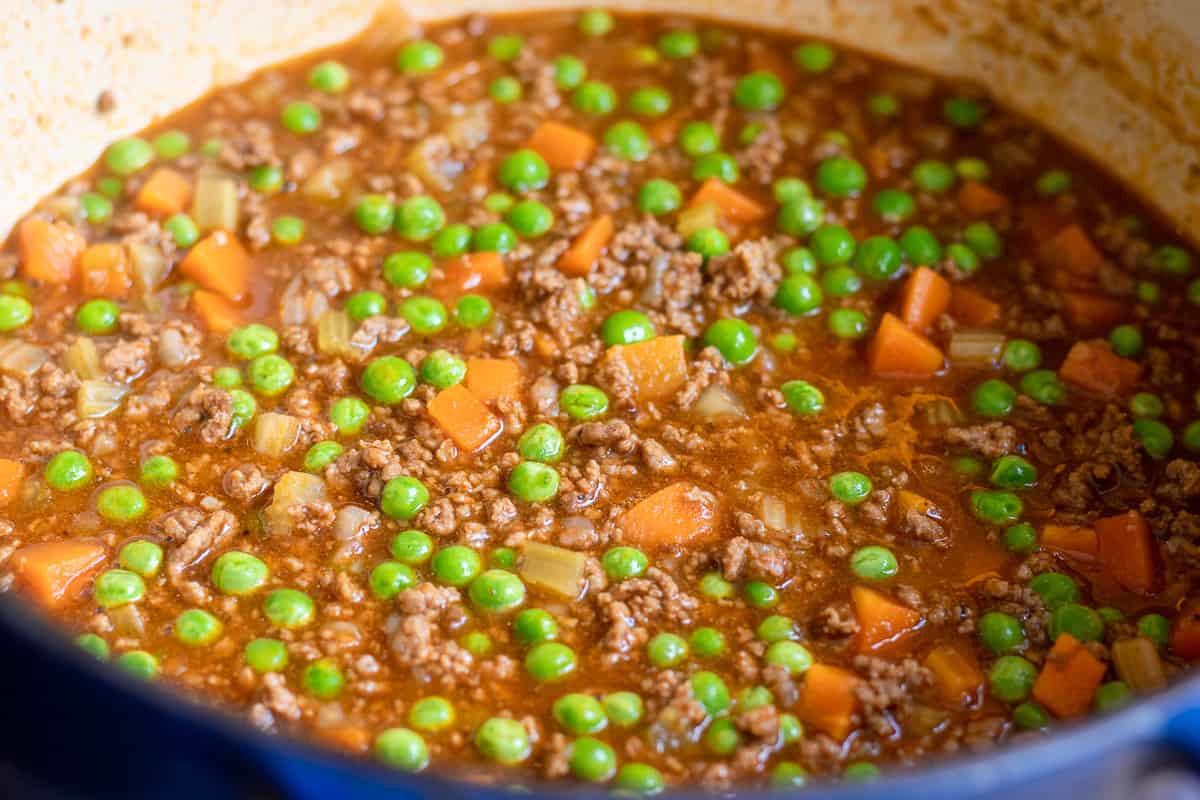 the sauce is gently simmered until it thickens