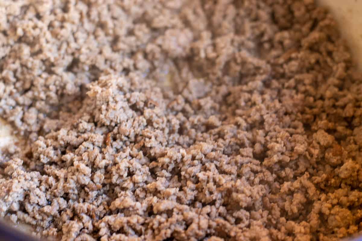 browning the mince in a dutch oven for cottage pie filling