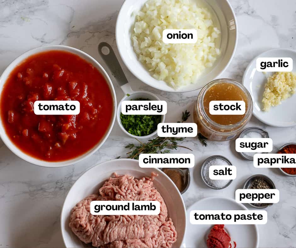 labelled picture of ingredients for moussaka lamb filling