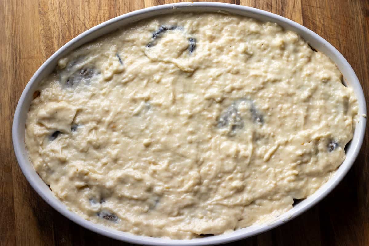 eggplants are covered with cheese sauce