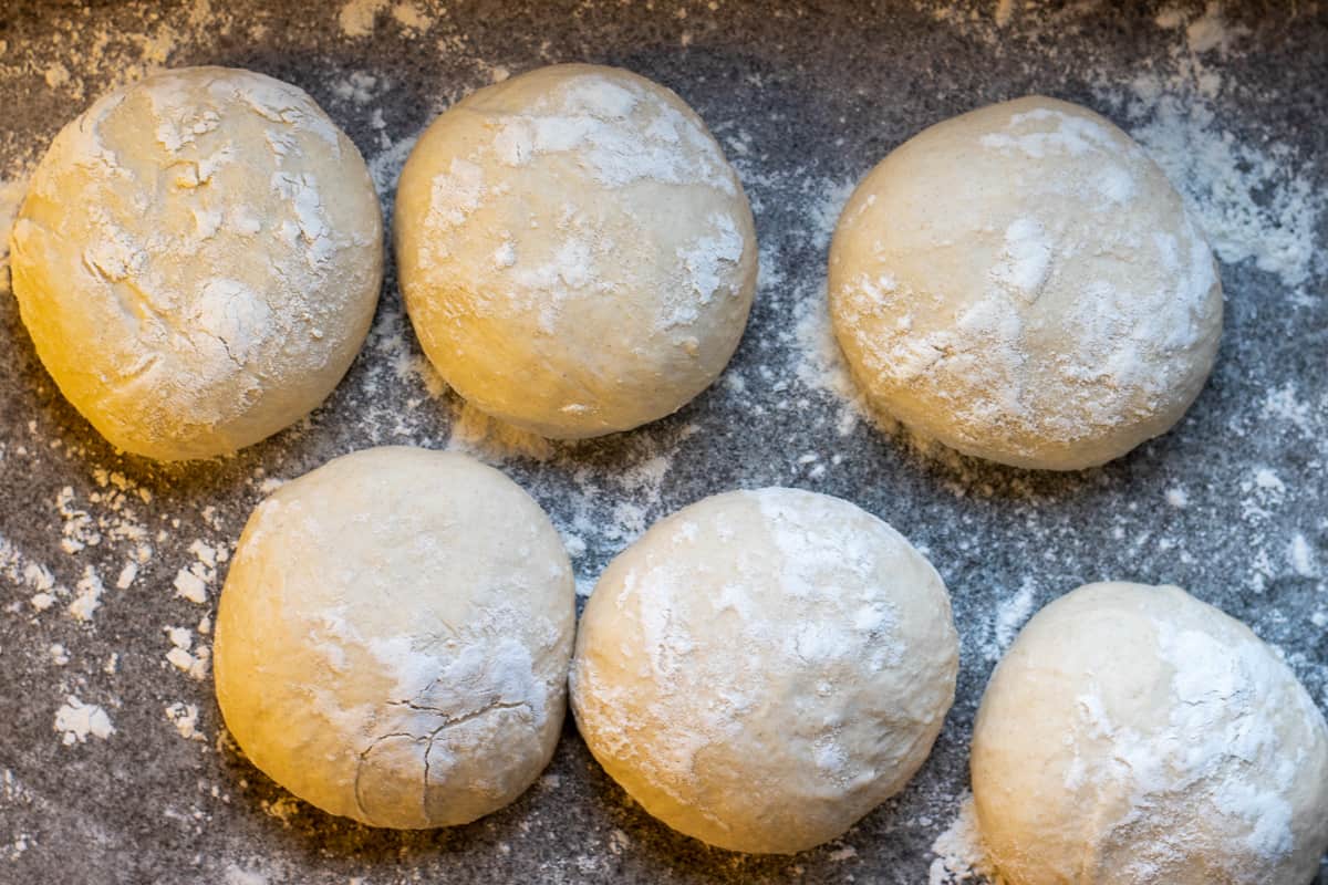 pita bread dough is divided in 6 equal balls