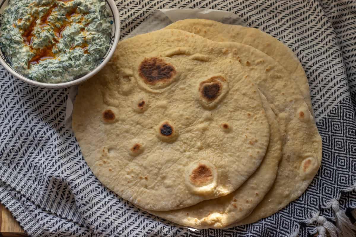 6 pieces of Greek pita bread served with spinach dip.