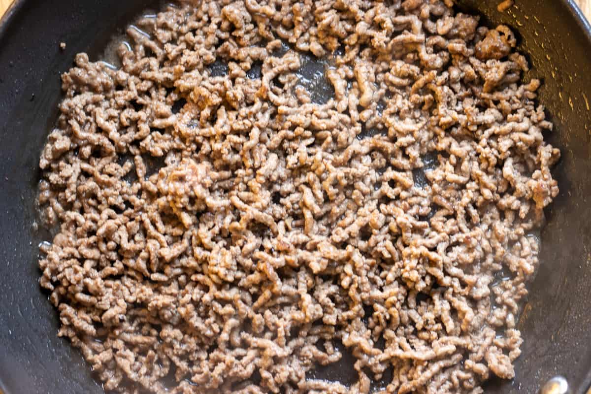browning the mince in a pan for Turkish moussaka