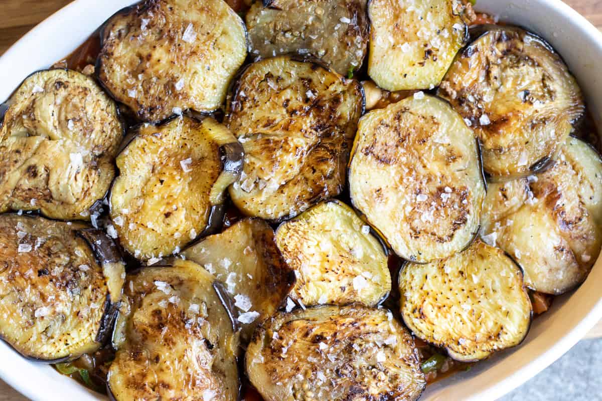 rest of the aubergines are layered on top of the meat sauce