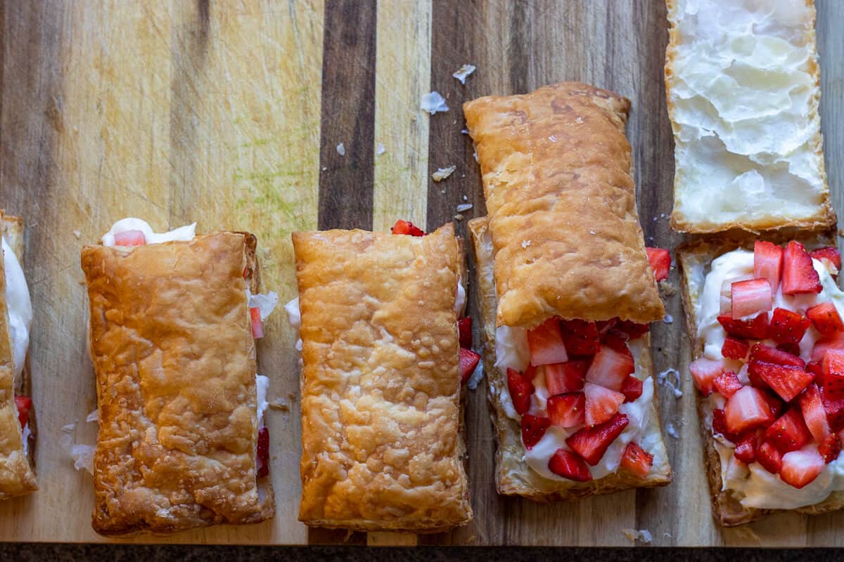 put the other pastry on top of the cream filled pastry piece