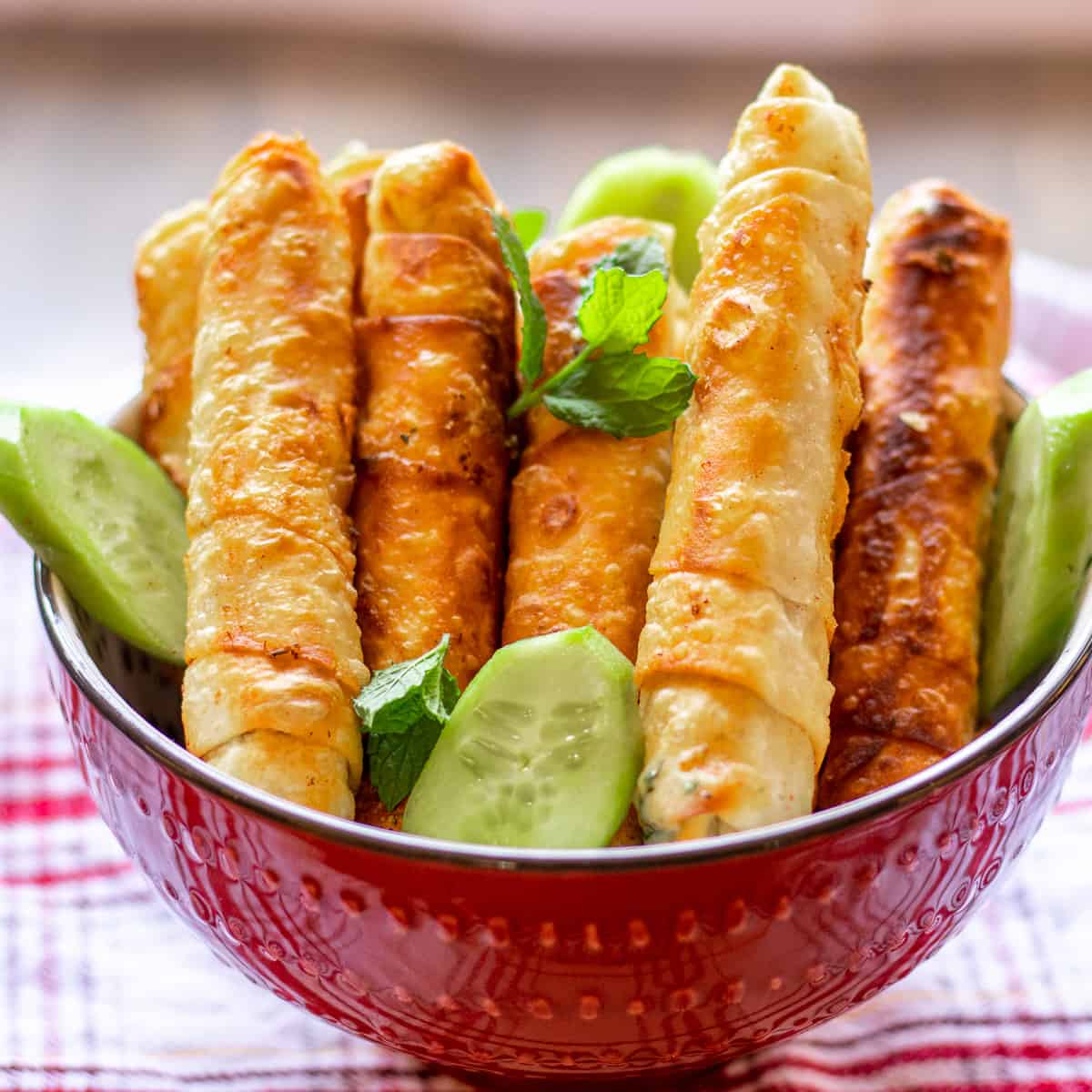 crispy Turkish cheese rolls - sigara borek filled with feta and halloumi