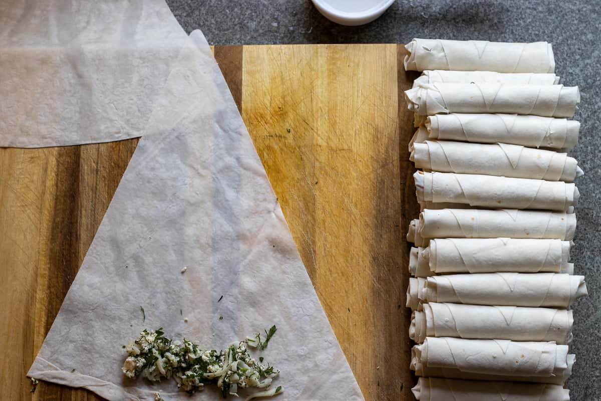 last couple of pieces of yufka triangles are being rolled