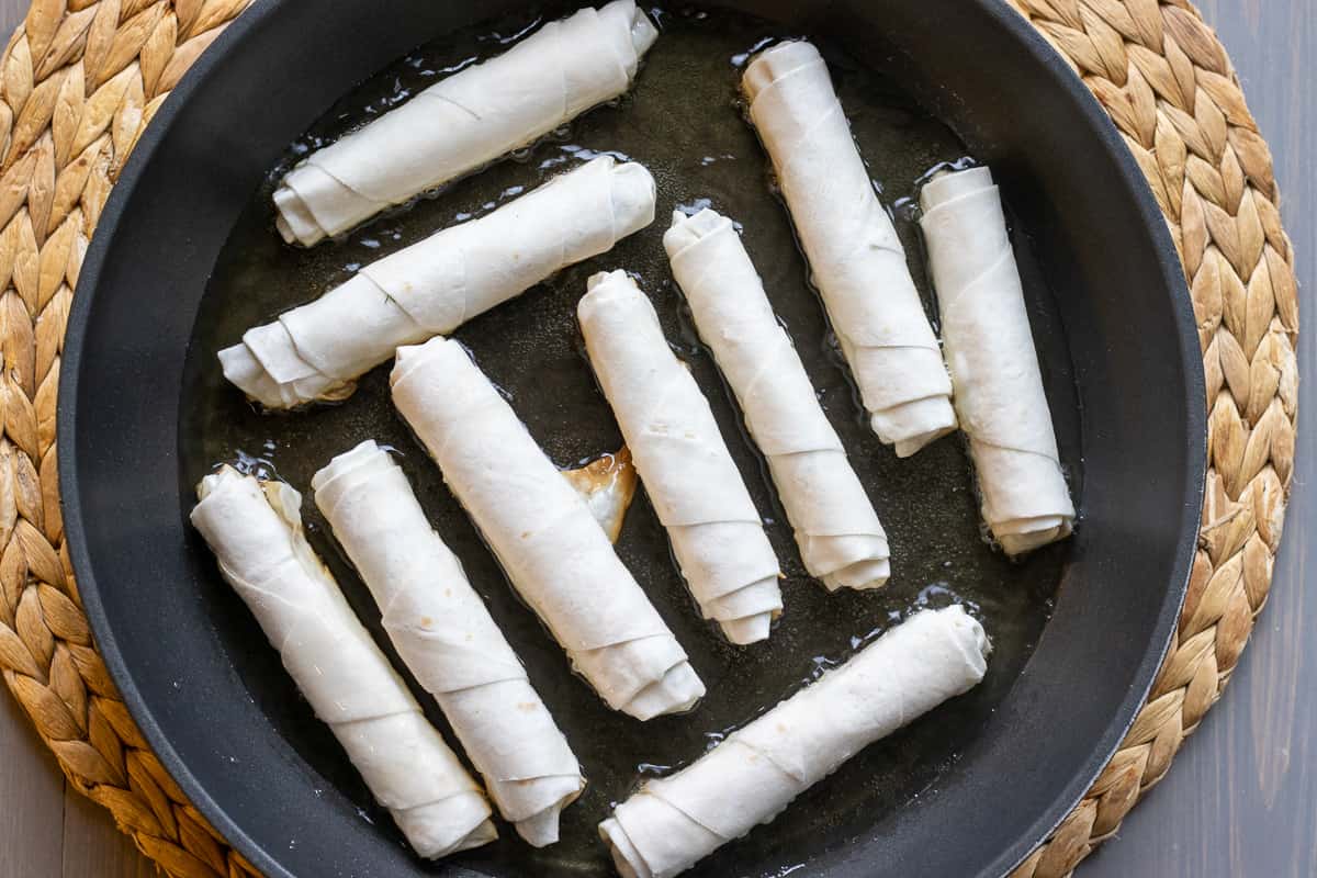frying 10 pieces of borek in hot oil