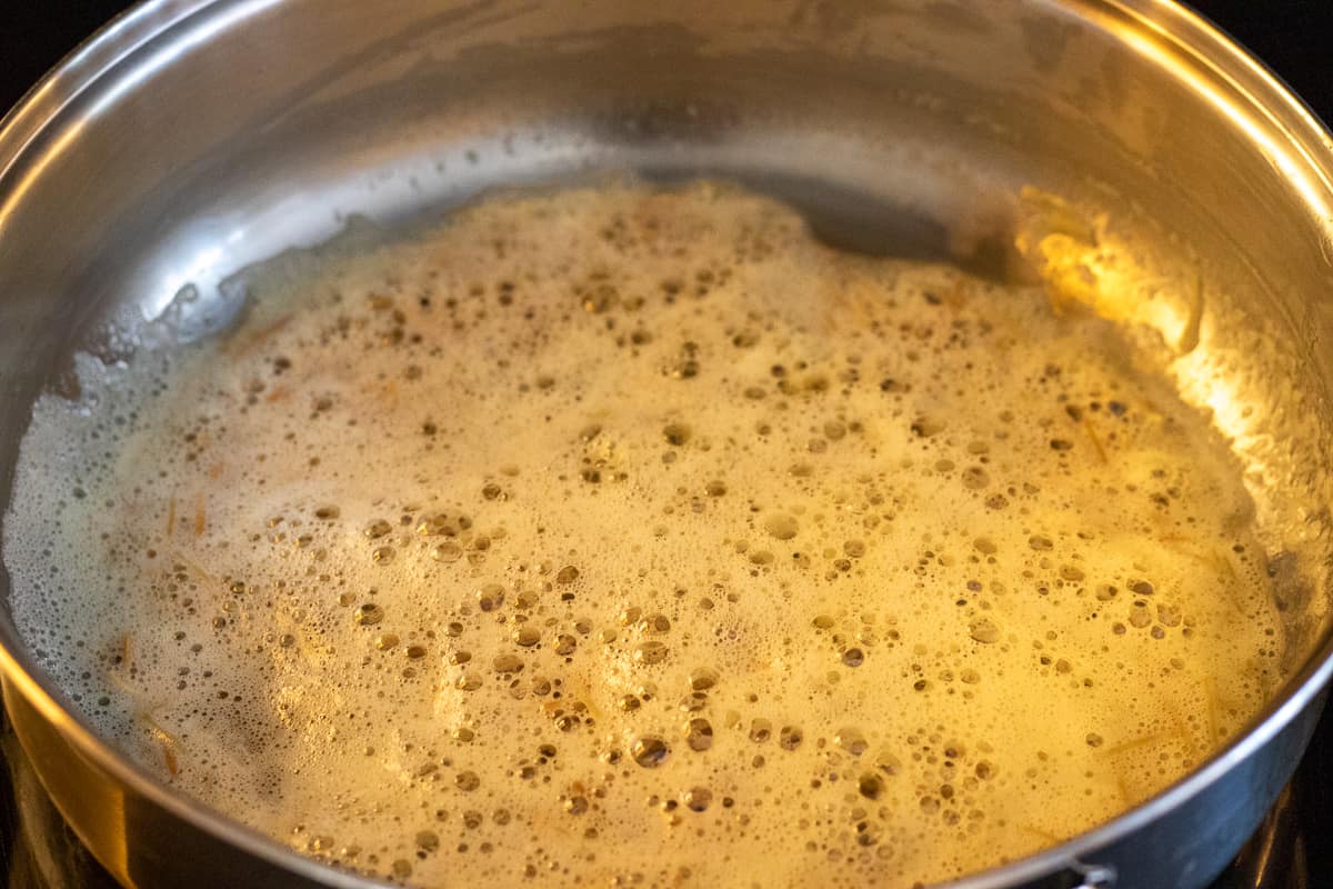 Sautéing the orzo or vermicelli in butter