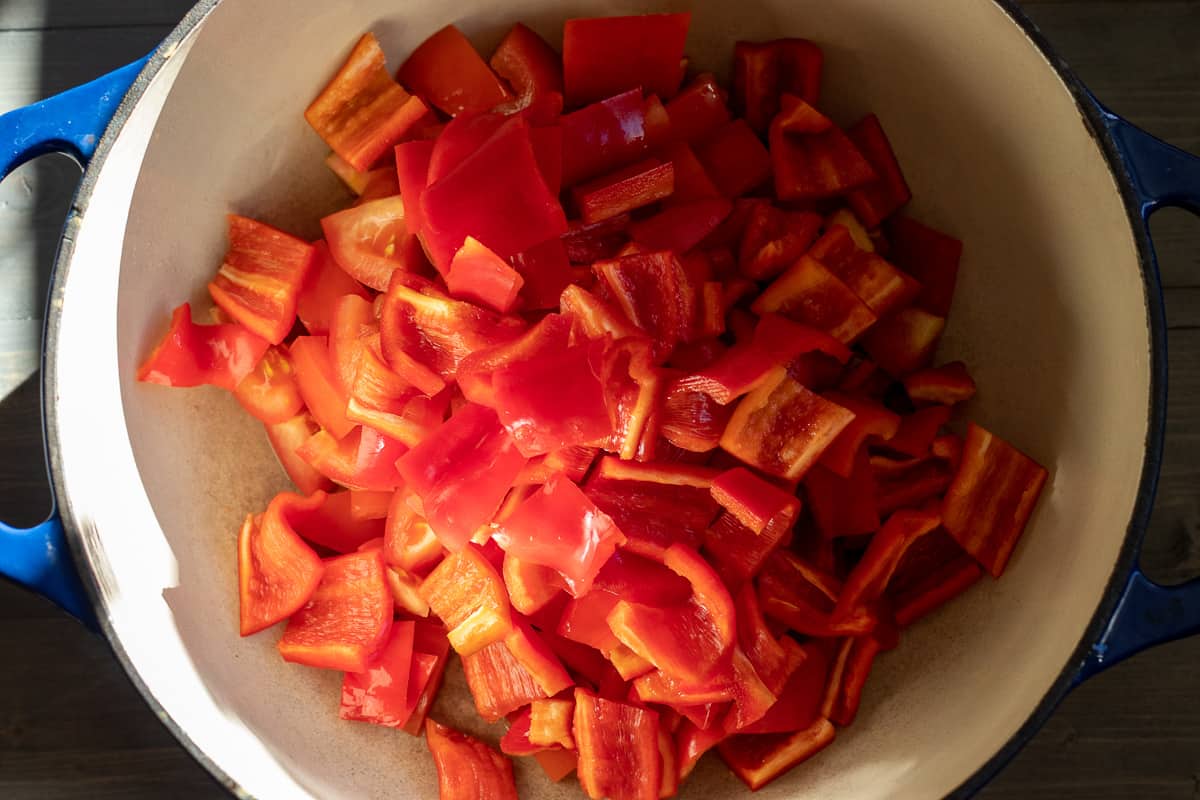 red peppers are added to the tomatoes