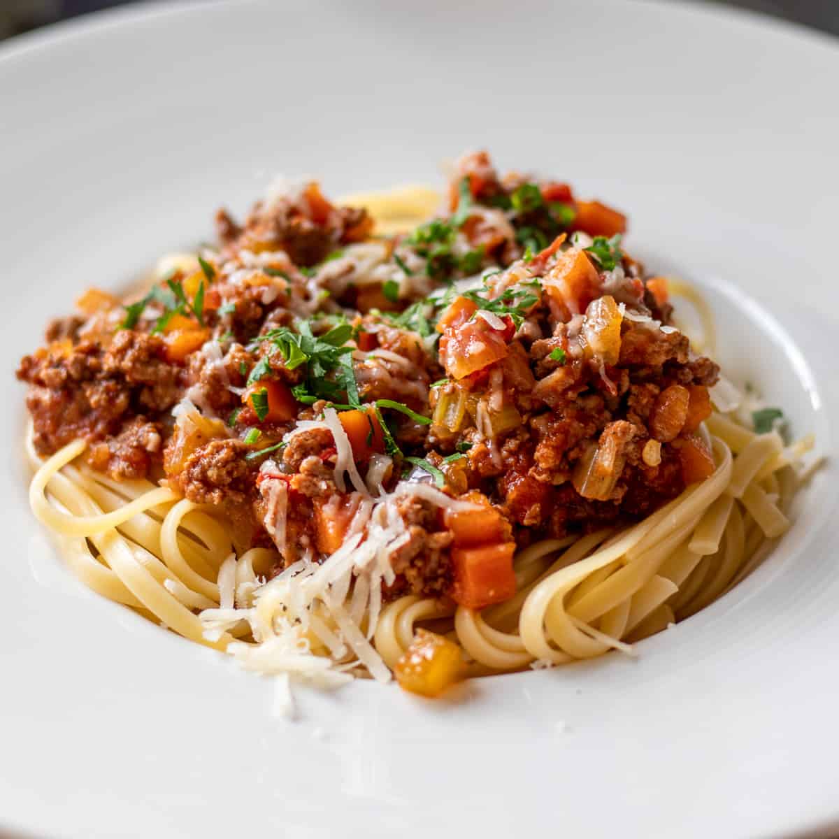 Lamb Bolognese sauce served on linguine pasta