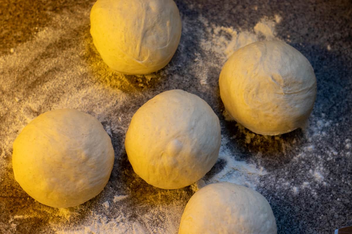 divide the gozleme(Turkish pancakes) dough in 5 pieces