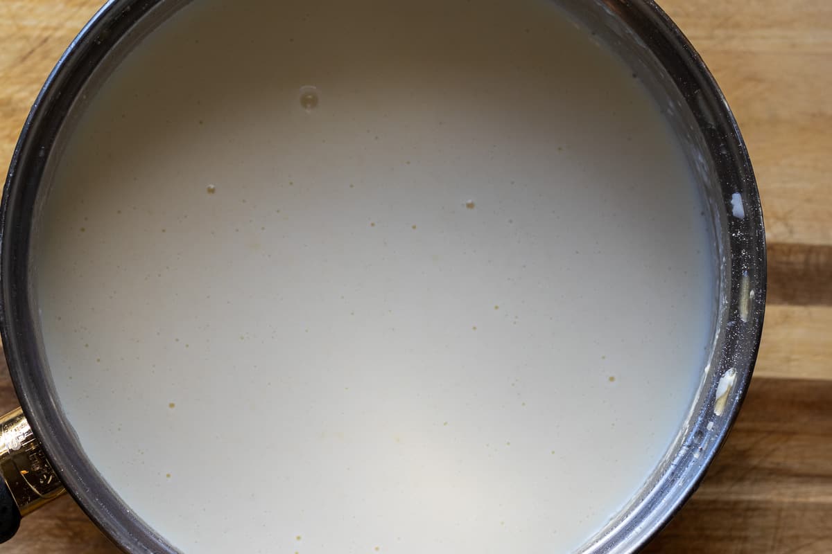 Bechamel sauce is taken off the heat.