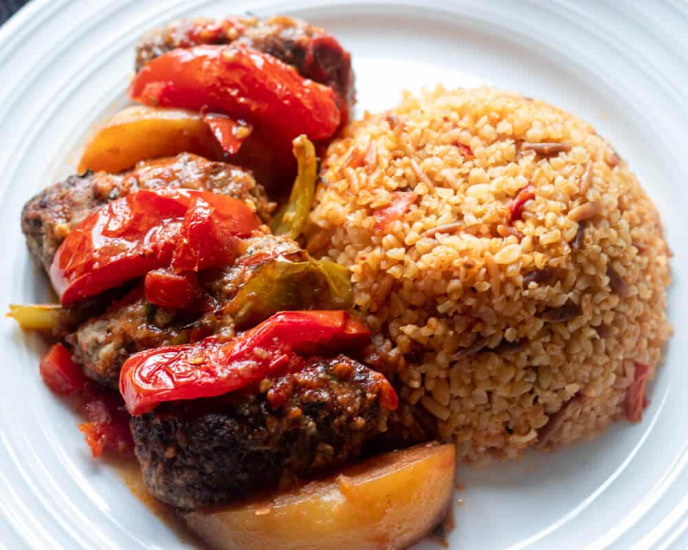 Izmir Kofte (Smyrna Meatballs) served with bulgur pilaf