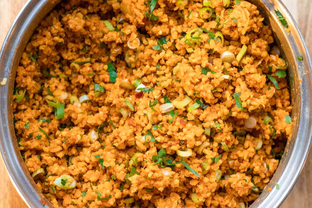 Chopped parsley and spring onions are added to bulgur mixture