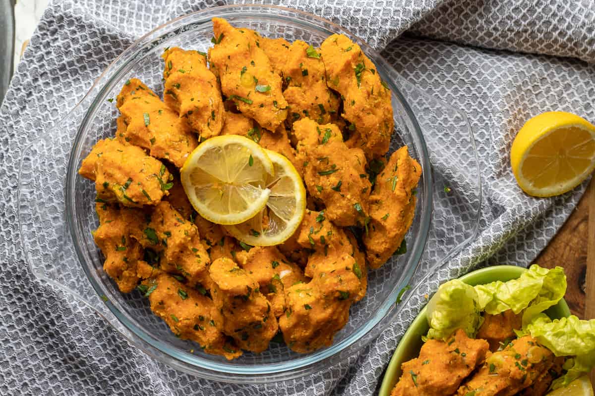 mercimek kofte or vegan lentil meatballs served on a glass plate