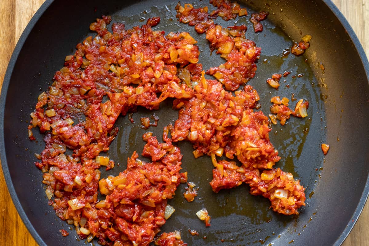 The spices and tomato&pepper paste added to onions