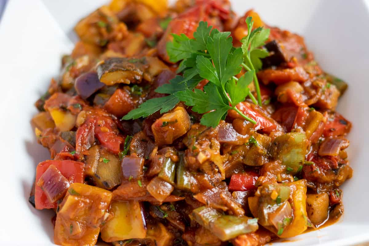 Traditional French Ratatouille Niçoise Recipe garnished with parsley leaves