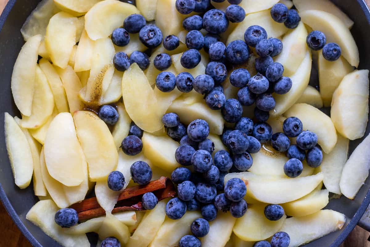 blueberries are added to cooked apples